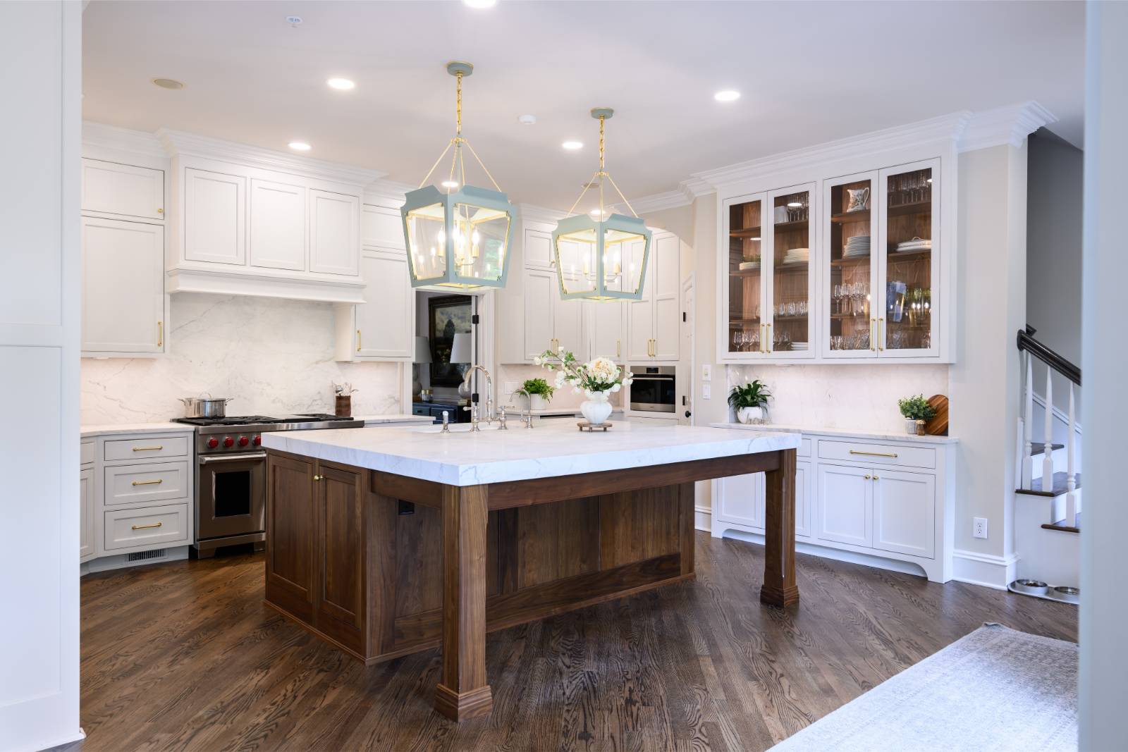 Two-tone white kitchen with walnut Buckskin-stained island and marble counters in Raleigh, NC