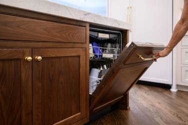 Two-tone white kitchen with walnut Buckskin-stained island and marble counters in Raleigh, NC
